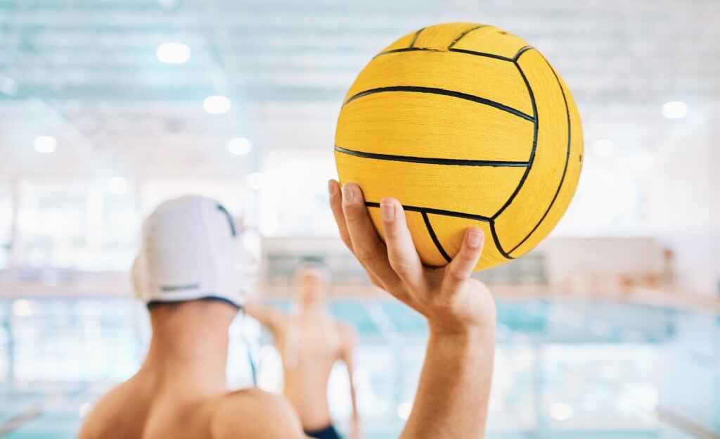 person with a ball for water polo