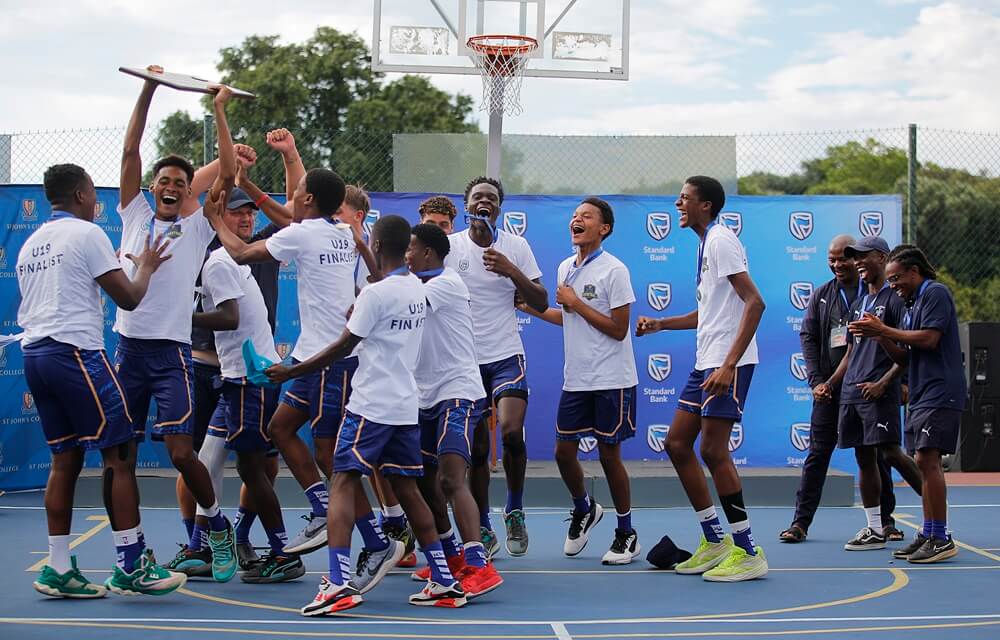 Northwood's Knights celebrate being crowned the champions after a brilliant performance in the 2024 final of the St John's Basketball Tournament.