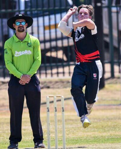 Clifton College in action at the St John's Rams T20 in 2023. Much of the inspiration for the Clifton T20, including the coloured playing kit, comes from the St John's Rams T20. 