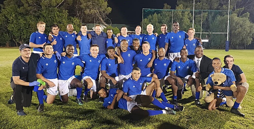 Happy smiles on the faces of the St Andrew's School 1st XV after a win under the lights of their Victoria Park home ground.