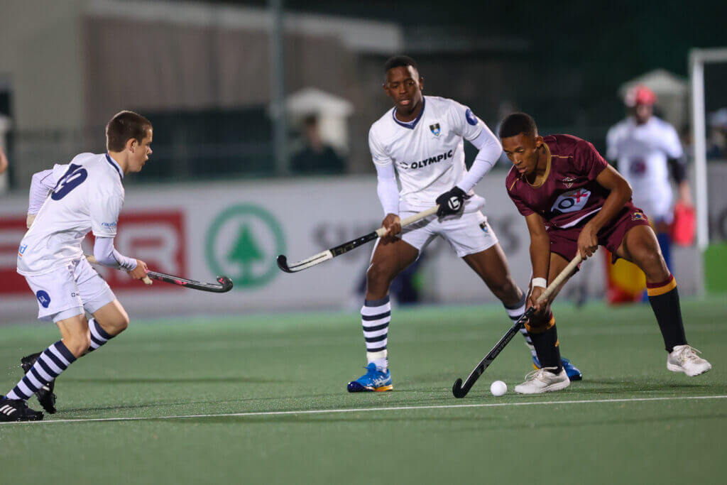 In possession is Paul Roos's Keith Siebrits surrounded by two SACS players during the Hibbert Shield final in Gqeberha on Saturday, 4 May 2024. Paul Roos won the encounter (6-5) on penalties after the regular time ended 3-3. Photo: Karl Seebach