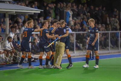 Grey College players celebrating their win over Grey High with head coach Wayne Coetzee. Photo: The Weekend Photography (Rikus Van Wyk)