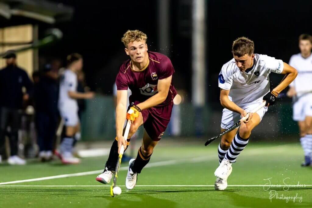PRG skipper, Reuben Sendzul in a tussle with SACS' Jo Le Roux in their encounter at the Maties Astroturf on Wednesday, 24 July 2024. Photo: Janco Saunders