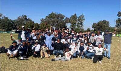 St Stithians College players and the school's supporters celebrate a successful defence of the Nedbank Grey College Soccer Tournament title.