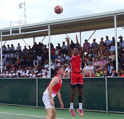 Inathi Masinga fires off a three-point attempt in a 64-40 win over Clifton College on 27 January 2024.