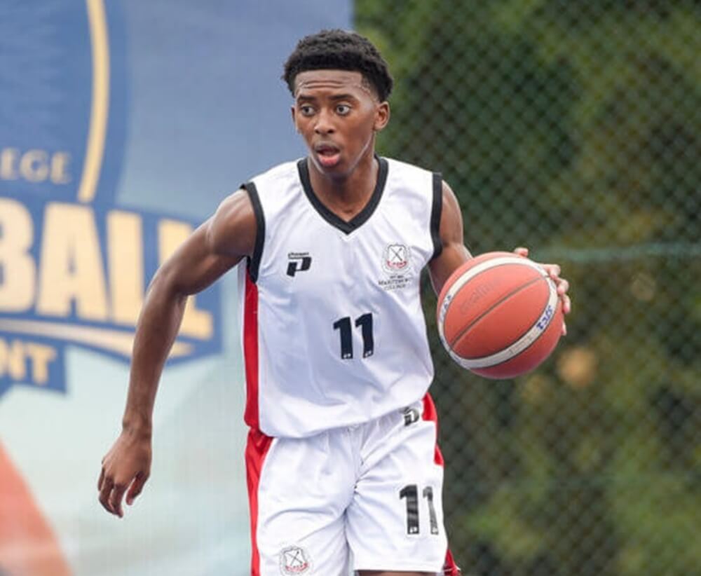 Inathi Masinga drives Maritzburg College up the court at the 2024 St John's Basketball Tournament.