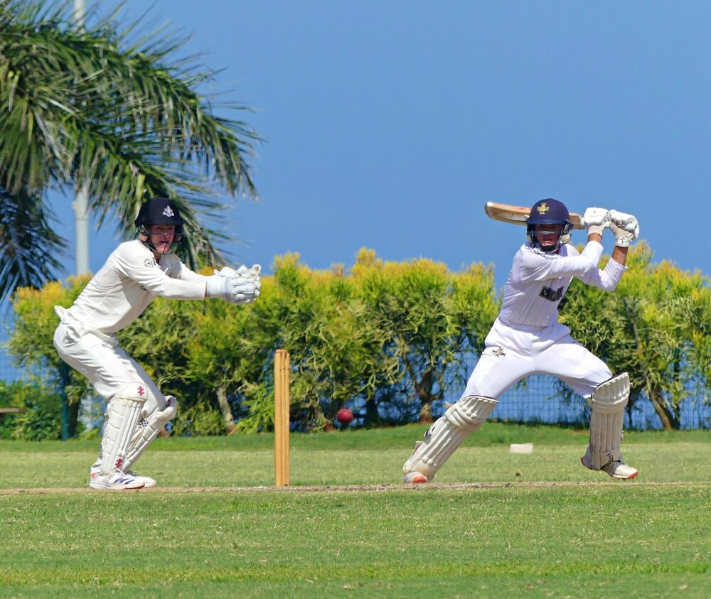 Northwood captain Kyle White cuts while watched by Hilton captain Ben Hockly. White score 50 for the Knights in a seven-wicket win over Hilton.