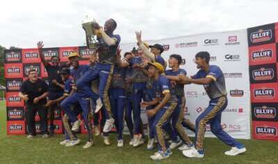 DHS captain Bayanda Majola jumps for joy, with the Clifton Centenary Cup in hand, after he and his team claimed the title for a second year in succession. Photo: Brad Morgan.