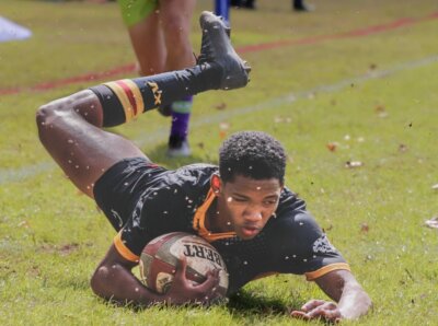 Deshean Pietersen crashes over for one of Dr EG Jansen's four tries in their tight win over Framesby. Photo: Tap Light Edits.