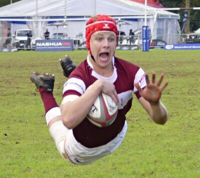 Jayden Jonsson makes the dive for five. He scored two of Kearsney's eight tries in a comfortable win over Peterhouse. Photo: Brad Morgan.