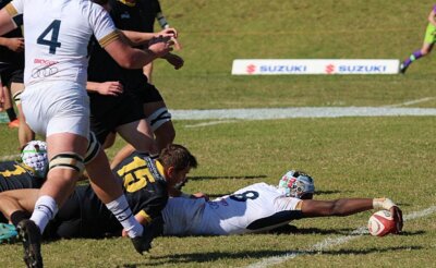 St Charles number eight, Raphael Ajibade, stretches across the try line for the first of his two tries against St David's Marist Inanda. Photo: St Charles College on Facebook.