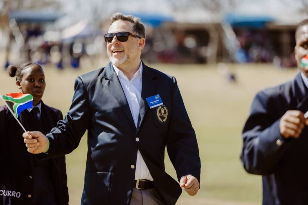 Cobus Loubser, the Chief Executive Officer of Curro Holdings, captured just before the conclusion of the 2025 Curro Halala Cup final between Northern Academy and Norkem Park High. Photo: Curro Sport.