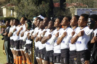 After a win over their great rivals, Dale College, the Queen's College 1st XV joined their school mates in singing the school's war cry. Photo: Queen's College on Facebook.