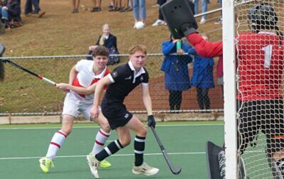 Henry Yeadon, who scored one of Michaelhouse's three goals, and Ben Wilson, the scorer of Hilton's goal, watch a shot from Yeadon as it heads towards goal. Photo: Brad Morgan.