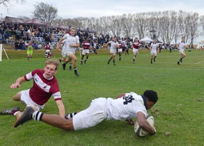 Tom Gurupira made the dive for five in the second half despite the despairing tackle of Fynn Verbaan. Photo: Brad Morgan.