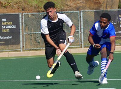 KZN Coastal A captain Ryde Brisset and his Western Province A counterpart, Mohloli Maseko. Maseko scored twice in regulation time, while Brisset, the Player of the Tournament, struck for his side in the penalty shootout. Photo: Brad Morgan.