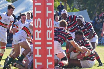 Francois de Beer powered over next to the uprights, dragging Maritzburg College defenders with him. Photo: Brad Morgan.