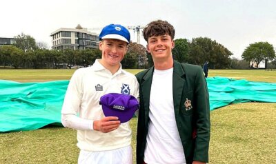 St Andrew's School's Spencer Murray earned his side's purple cap thanks to his 71 runs. The cap was handed to him by KES' captain, Tyler Cloete. Photo: AJ van Wyk.