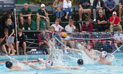 Kearsney's goalkeeper Rourke Stacey dives to fend off a shot from Hilton College's Bradley van Loggerenberg in the final of the Clifton Water Polo Tournament. Photo: Brad Morgan.