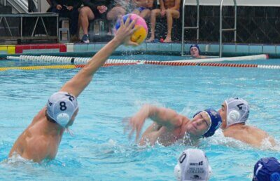 Hilton College's Bradley van Loggerenberg blocks a shot by Northwood's Tristan Parkinson in a thrilling contest that Hilton won 12-11. Photo: Brad Morgan.