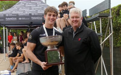 Hilton College captain Andrew Schnell received the winner's trophy from Clifton College's Executive Headmaster, Adam Rogers. Photo: Brad Morgan.